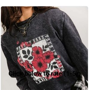 bold graphic print.Crew necklineLong sleevesUnisex fitGrat